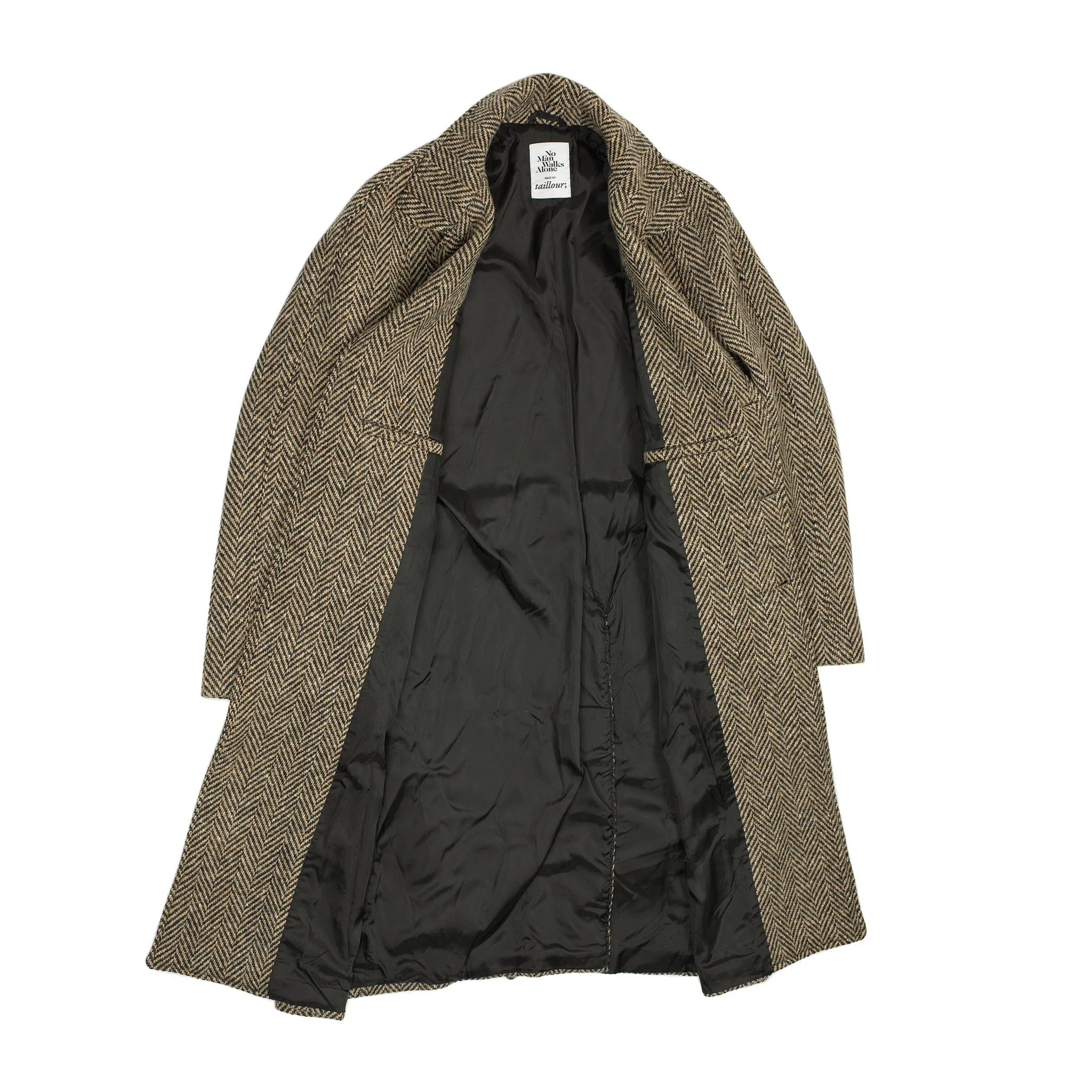 Belted balmacaan coat in handloomed Donegal oatmeal-black herringbone tweed